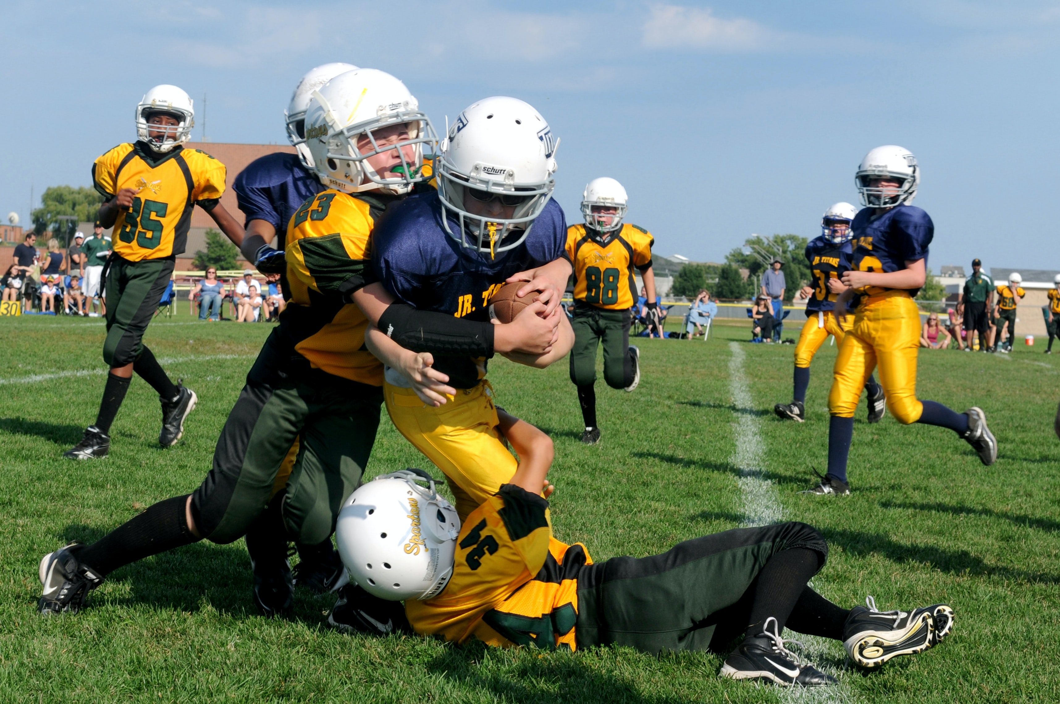 Kids playing football